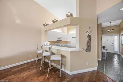 7725 Pebble Creek Cir #305, Naples, FL 34108 - Photo 16