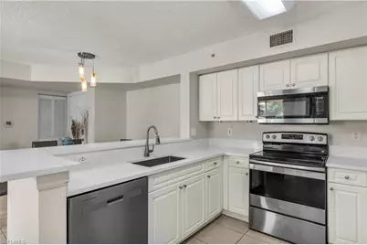 1230 Wildwood Lakes Blvd #105, Naples, FL 34104 - Photo 18