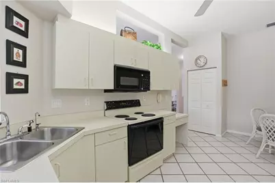 7680 Oleander Gate Dr #J202, Naples, FL 34109 - Photo 12