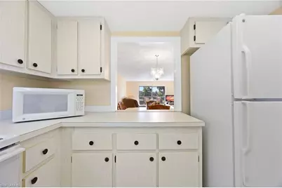 5683 Rattlesnake Hammock Rd #A-202, Naples, FL 34113 - Photo 12