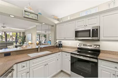 7670 Pebble Creek Cir #103, Naples, FL 34108 - Photo 8