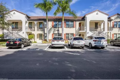 15114 Palmer Lake Cir #104, Naples, FL 34109 - Photo 2