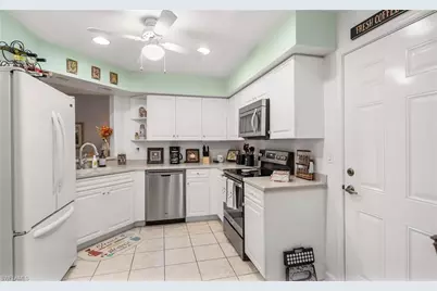 25085 Peacock Ln #102, Naples, FL 34114 - Photo 8