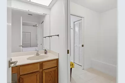 1833 Courtyard Way #E105, Naples, FL 34112 - Photo 16