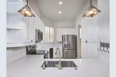 1033 Egrets Walk Cir #203, Naples, FL 34108 - Photo 18