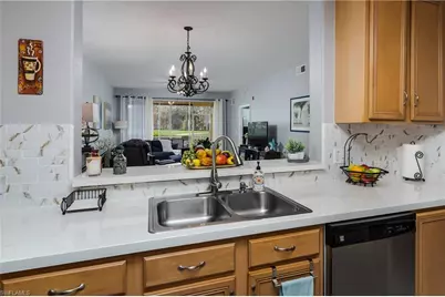 6828 Sterling Greens Pl #101, Naples, FL 34104 - Photo 14