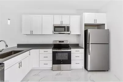 930 Hepburn Ave, Lehigh Acres, FL 33974 - Photo 18