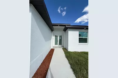 1121 Florence St E, Lehigh Acres, FL 33974 - Photo 4