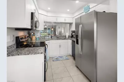 137 Wading Bird Cir #F103, Naples, FL 34110 - Photo 4