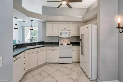 6812 Satinleaf Rd S #202, Naples, FL 34109 - Photo 8