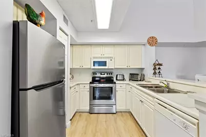 1180 Wildwood Lakes Blvd #303, Naples, FL 34104 - Photo 12