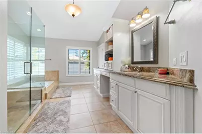 12856 Bald Cypress Ln, Naples, FL 34119 - Photo 24