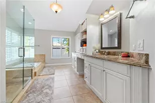 12856 Bald Cypress Ln, Naples, FL 34119 - Photo 24