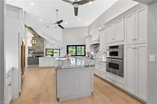 12856 Bald Cypress Ln, Naples, FL 34119 - Photo 14