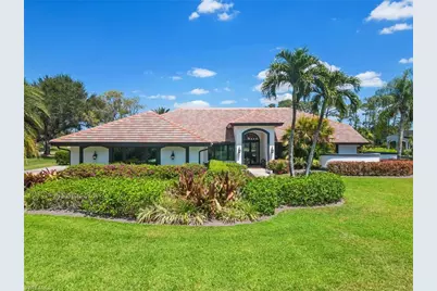 12856 Bald Cypress Ln, Naples, FL 34119 - Photo 1