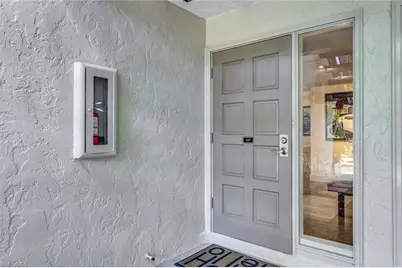 105 Wilderness Dr #107, Naples, FL 34105 - Photo 2