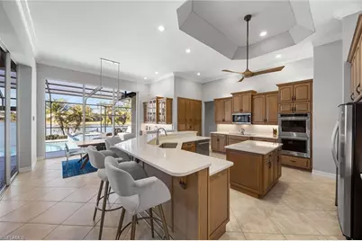 8985 Star Tulip Ct, Naples, FL 34113 - Photo 16