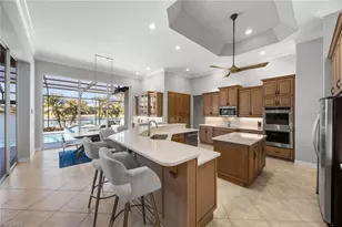 8985 Star Tulip Ct, Naples, FL 34113 - Photo 16