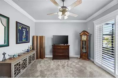 8985 Star Tulip Ct, Naples, FL 34113 - Photo 26