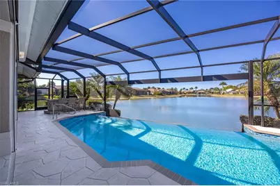 8985 Star Tulip Ct, Naples, FL 34113 - Photo 6