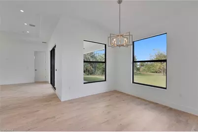 715 Theodore Vail St E, Lehigh Acres, FL 33974 - Photo 8