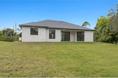 715 Theodore Vail St E, Lehigh Acres, FL 33974 - Photo 18