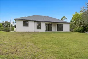 715 Theodore Vail St E, Lehigh Acres, FL 33974 - Photo 18