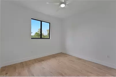 715 Theodore Vail St E, Lehigh Acres, FL 33974 - Photo 14