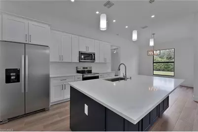 717 Theodore Vail St E, Lehigh Acres, FL 33974 - Photo 6