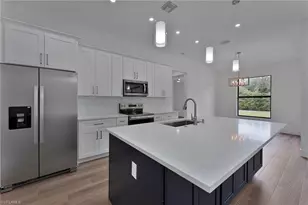 717 Theodore Vail St E, Lehigh Acres, FL 33974 - Photo 6