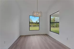 717 Theodore Vail St E, Lehigh Acres, FL 33974 - Photo 8