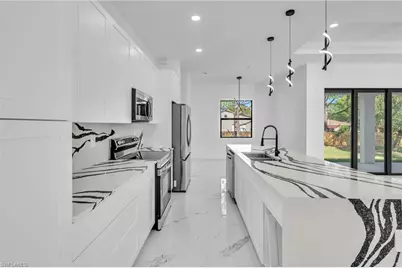 3409 24th St SW, Lehigh Acres, FL 33976 - Photo 4