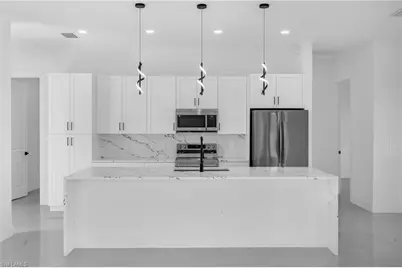 3110 23rd St SW, Lehigh Acres, FL 33976 - Photo 4