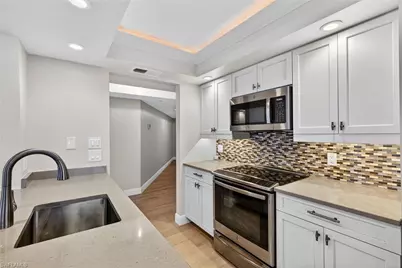 6020 Pelican Bay Blvd #E402, Naples, FL 34108 - Photo 2