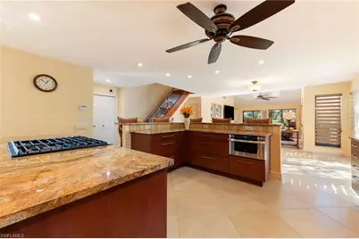 11737 Quail Village Way, Naples, FL 34119 - Photo 16