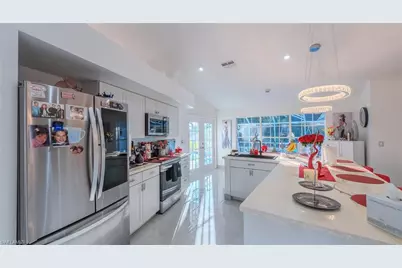 22690 Island Lakes Dr, Estero, FL 33928 - Photo 10