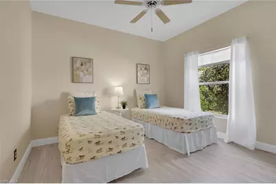 4381 Mistlethrush Ln, Naples, FL 34119 - Photo 20