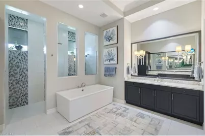 8998 Arrezo Ct, Naples, FL 34119 - Photo 20