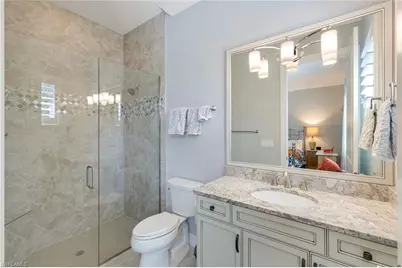 8998 Arrezo Ct, Naples, FL 34119 - Photo 28