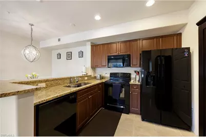 13180 Bella Casa Cir #166, Fort Myers, FL 33966 - Photo 6