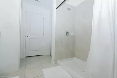 20080 Caroline Creek Pl, Lehigh Acres, FL 33974 - Photo 18