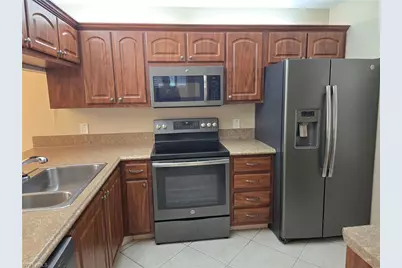 2656 Kings Lake Blvd #7-101, Naples, FL 34112 - Photo 2