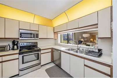 1208 Commonwealth Cir #J101, Naples, FL 34116 - Photo 8