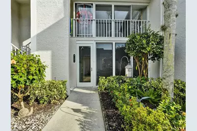 458 Country Hollow Ct #H102, Naples, FL 34104 - Photo 1