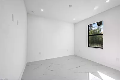 865 Chipley St E, Lehigh Acres, FL 33974 - Photo 18