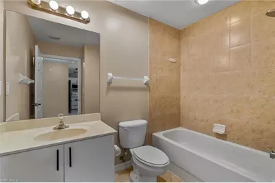 4530 Botanical Place Cir #406, Naples, FL 34112 - Photo 12