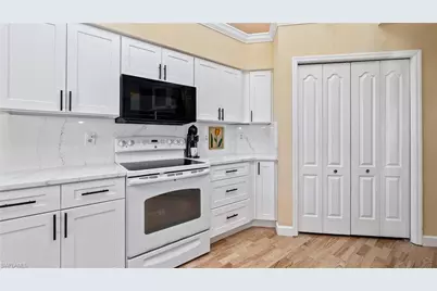 2237 Heritage Greens Dr, Naples, FL 34119 - Photo 12