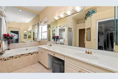 2237 Heritage Greens Dr, Naples, FL 34119 - Photo 30