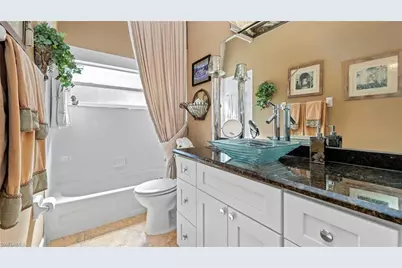 2237 Heritage Greens Dr, Naples, FL 34119 - Photo 34