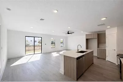 1608 Gene Ave S, Lehigh Acres, FL 33976 - Photo 6